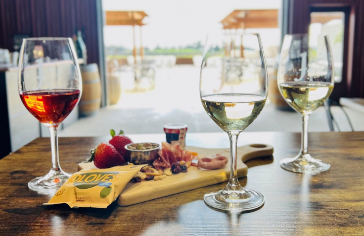 A wine flight and a charcuterie board on the Lockeford patio