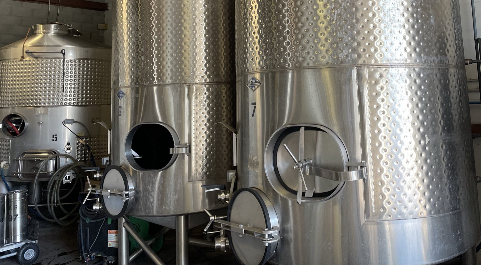 Stainless steel fermentation tanks in the winery